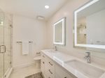 Newly Renovated Master Bathroom with Double Vanity and Shower at 4 Driftwood